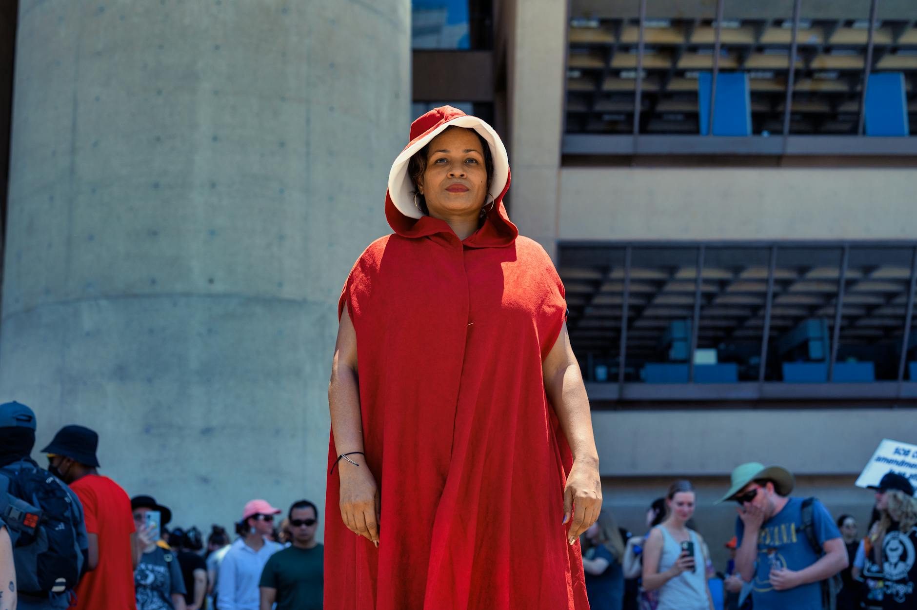 ‘Handmaids’ Storm Capitol in Chilling Protest as Congress Returns