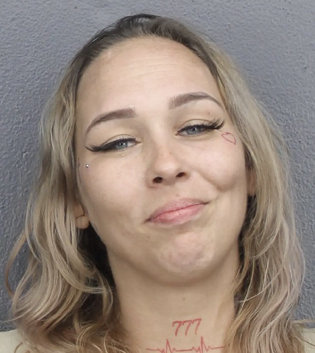 Face-Tattooed Mom Smiles After Allegedly Shooting Sister