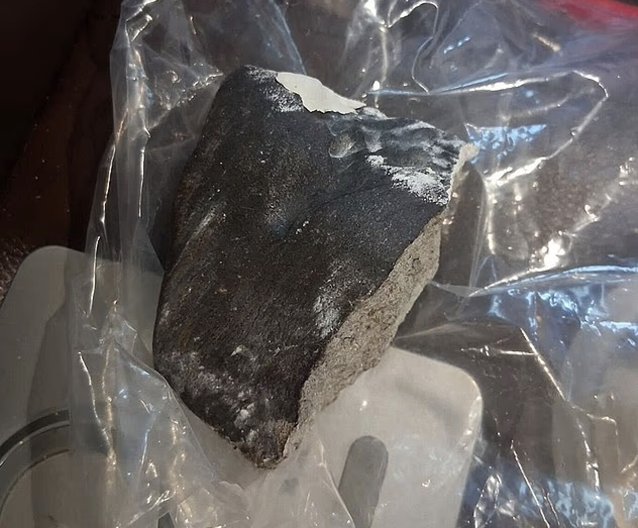 Houston Boom Leaves Space Rock in Woman’s Roof